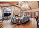 Spacious living room boasts hardwood floors, a cozy stone fireplace, and comfortable seating at 192 Maple Wood Dr, Lawrenceville, GA 30046