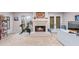 Comfortable main bedroom has a seating area and a fireplace at 192 Maple Wood Dr, Lawrenceville, GA 30046