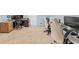 Large office space with multiple desks, neutral carpet, and an efficient design for a productive work environment at 192 Maple Wood Dr, Lawrenceville, GA 30046