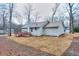 Backyard featuring a deck and chimney at 2370 Old Mill Sw Dr, Conyers, GA 30094