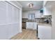 Kitchen featuring all white cabinets, granite countertops, and a stainless steel dishwasher at 2370 Old Mill Sw Dr, Conyers, GA 30094