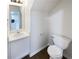 This bathroom features a single sink vanity and a toilet at 180 Fieldview Ln, Covington, GA 30016