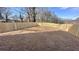 Expansive backyard with a newly installed wooden fence, ready for landscaping at 3128 Cedar St, Scottdale, GA 30079