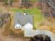 Aerial view of home featuring well-maintained lawn and an extended driveway at 429 Mulberry Rock Road, Temple, GA 30179