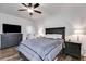 Bedroom with dark wood furnishings, wood-look floors, and neutral decor at 429 Mulberry Rock Road, Temple, GA 30179