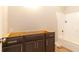 Bathroom featuring dark brown cabinets and a white bathtub at 472 Price Rd, Carrollton, GA 30116