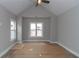 Spacious bedroom featuring a vaulted ceiling and ample natural light at 472 Price Rd, Carrollton, GA 30116