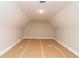 Unfinished bonus room shows space and natural lighting at 472 Price Rd, Carrollton, GA 30116