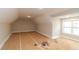 Unfinished bonus room shows space and natural lighting at 472 Price Rd, Carrollton, GA 30116