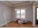 Dining room featuring a tray ceiling and chandelier at 472 Price Rd, Carrollton, GA 30116