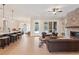 Open-concept layout with a living room flowing into a kitchen and office area at 472 Price Rd, Carrollton, GA 30116