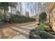 Landscaped backyard featuring stepping stone pathway at 11180 West Rd, Roswell, GA 30075