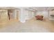 Finished basement with staircase, open floor plan and a pool table at 11180 West Rd, Roswell, GA 30075
