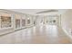 Basement featuring large windows and doors leading to the outside at 11180 West Rd, Roswell, GA 30075