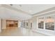 Finished basement features tiled floors and a partial view of billiards room at 11180 West Rd, Roswell, GA 30075