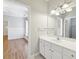 Bathroom with a large vanity, storage and an attached door to a bedroom at 11180 West Rd, Roswell, GA 30075