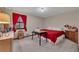 Bedroom features carpet floors, red curtains and a view of the trees outside at 2731 Tritt Springs Ne Dr, Marietta, GA 30062