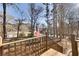 Front yard view showing the property and neighborhood, accentuated by an American flag at 2731 Tritt Springs Ne Dr, Marietta, GA 30062
