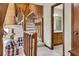 View of a home's staircase and hallway with a bathroom and living room visible at 2731 Tritt Springs Ne Dr, Marietta, GA 30062