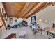 An upstairs living room featuring wood ceilings, carpeted floors, comfortable seating and plenty of sunlight at 2731 Tritt Springs Ne Dr, Marietta, GA 30062