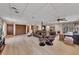 This spacious living room features hardwood floors and comfortable leather furniture at 2731 Tritt Springs Ne Dr, Marietta, GA 30062