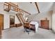 Bright main bedroom features carpet floors, a high vaulted ceiling with wooden beams, and a sleeping loft at 2731 Tritt Springs Ne Dr, Marietta, GA 30062
