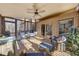 This screened porch features comfortable seating and a great view of the outdoors at 2731 Tritt Springs Ne Dr, Marietta, GA 30062