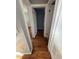 Hallway displaying hardwood flooring and multiple doorways leading to different rooms at 561 Formwalt Sw St # 5, Atlanta, GA 30312