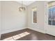 Small dining area with hardwood floors, modern light fixture and plenty of natural light at 264 Castleberry Station Sw Dr, Atlanta, GA 30313