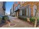 Modern brick townhome with landscaped front yard and stylish architectural details at 264 Castleberry Station Sw Dr, Atlanta, GA 30313