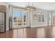 Charming kitchen with stainless steel appliances, modern lighting, and large windows at 264 Castleberry Station Sw Dr, Atlanta, GA 30313
