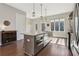Beautiful open kitchen with modern island and pendant lighting, providing ample counter space at 264 Castleberry Station Sw Dr, Atlanta, GA 30313