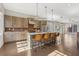 Open-concept kitchen with modern design, island seating, and stainless steel appliances at 264 Castleberry Station Sw Dr, Atlanta, GA 30313