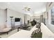 Inviting living area with sofa, modern decor, and open floor plan to dining space at 264 Castleberry Station Sw Dr, Atlanta, GA 30313