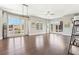 Bright open living room with hardwood floors, many windows, and natural light at 264 Castleberry Station Sw Dr, Atlanta, GA 30313