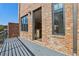 Brick patio featuring an open door to the interior at 264 Castleberry Station Sw Dr, Atlanta, GA 30313
