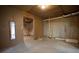 Spacious unfinished basement space with concrete floor and exposed ceiling, ready for customization at 6674 Mimosa Cir, Tucker, GA 30084
