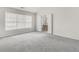 Bedroom with neutral carpet and an ensuite bathroom entrance at 4878 Hairston Park Sq, Stone Mountain, GA 30083