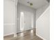 Bright entryway featuring a white door with window accents and modern flooring at 4878 Hairston Park Sq, Stone Mountain, GA 30083