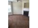 Living room showcasing the fireplace with white mantle and black granite hearth at 8170 Oakley Cir, Union City, GA 30291
