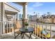 Inviting balcony with a table and chairs, offering city views at 201 16Th Nw St # 4, Atlanta, GA 30363