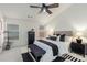 A bedroom featuring neutral decor, a ceiling fan, and large windows for plenty of natural light at 201 16Th Nw St # 4, Atlanta, GA 30363