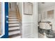 Bright entryway with hardwood stairs and modern office space at 201 16Th Nw St # 4, Atlanta, GA 30363