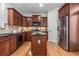 Well-equipped kitchen with stainless steel appliances, wood cabinetry, and functional center island at 201 16Th Nw St # 4, Atlanta, GA 30363