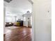 Inviting living room featuring a fireplace, hardwood floors, and bright natural light at 2163 Ben Hill Rd, Atlanta, GA 30344