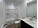 Bathroom featuring tile floors, toilet, vanity and bathtub with shower at 2105 Stillhaven Pl, Douglasville, GA 30135