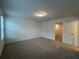 Bedroom with a neutral colored carpet, a window, and white walls at 2105 Stillhaven Pl, Douglasville, GA 30135