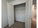 Open closet with one wire shelf at 2105 Stillhaven Pl, Douglasville, GA 30135