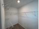 Walk-in closet with metal shelving at 2105 Stillhaven Pl, Douglasville, GA 30135