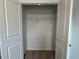 Open closet with one wire shelf at 2105 Stillhaven Pl, Douglasville, GA 30135
